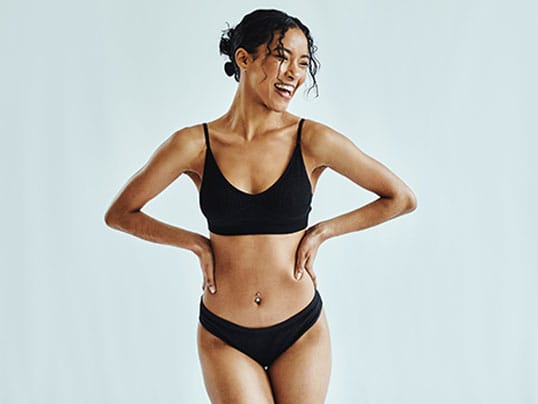 woman after her tummy tuck in Fort Lauderdale, FL